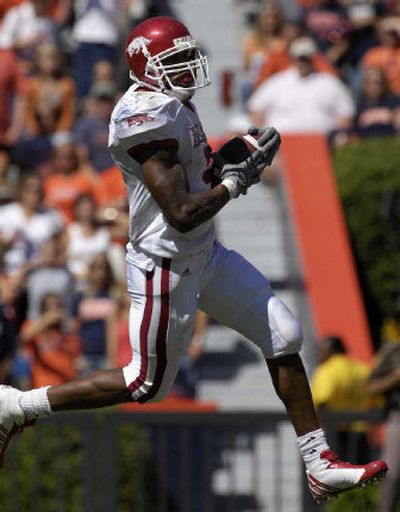 
Arkansas running back puts the finishing touches on a 63-yard touchdown run in the first half Saturday. 
 (Associated Press / The Spokesman-Review)