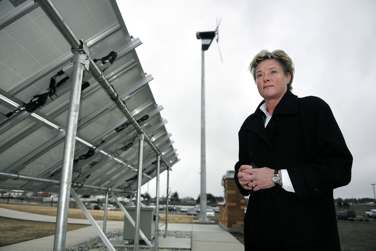 Demand Energy Networks, for which Randi Neilson is a vice president, has developed a battery-based system for storing electricity. This demonstration project at Inland Power and Light includes wind-generated and solar power feeding into the battery container beneath the solar panel.danp@spokesman.com (Dan Pelle / The Spokesman-Review)