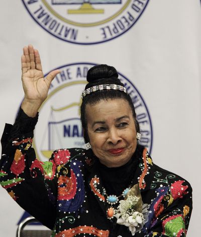 In this May 2, 2011, file photo, Xernona Clayton waves at the NAACP Freedom Dinner news conference in Detroit. (Carlos Osorio / Associated Press)