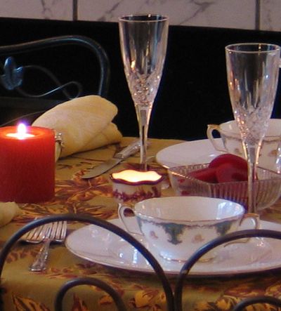 Thanksgiving at home, surrounded by friends and family, at a table set with heirloom china, crystal and silver, can be a greener way to celebrate. (Cheryl-Anne Millsap / Down to Earth NW)