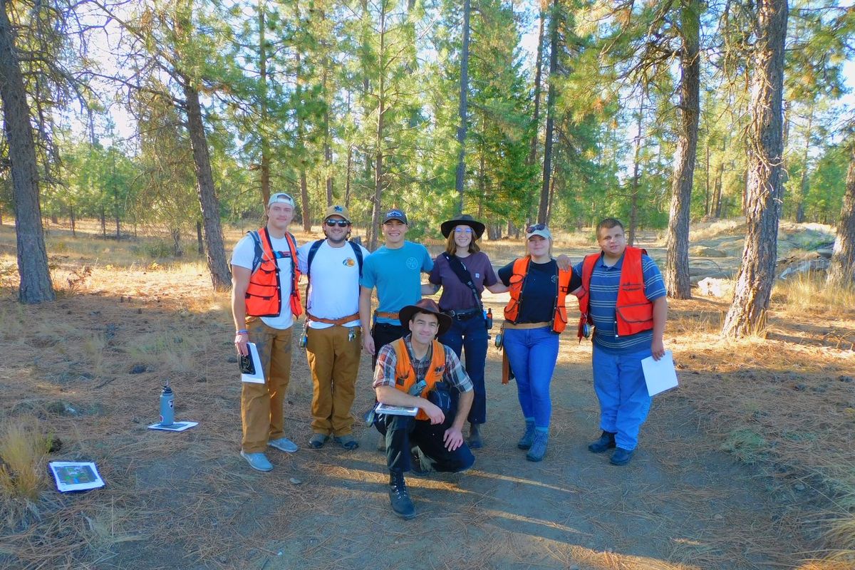 The Washington State University School of the Environment students are researching and developing a forest management plan for the Riverside School District's 97-acre natural area. Pictured, in back row from left, are Dillon Young, Kieran Godfrey, Rudy Engstrom, Frances Guetlich, Megan Milan and C.J. Radawick. In front is Professor Mark E. Swanson.  (Courtesy)