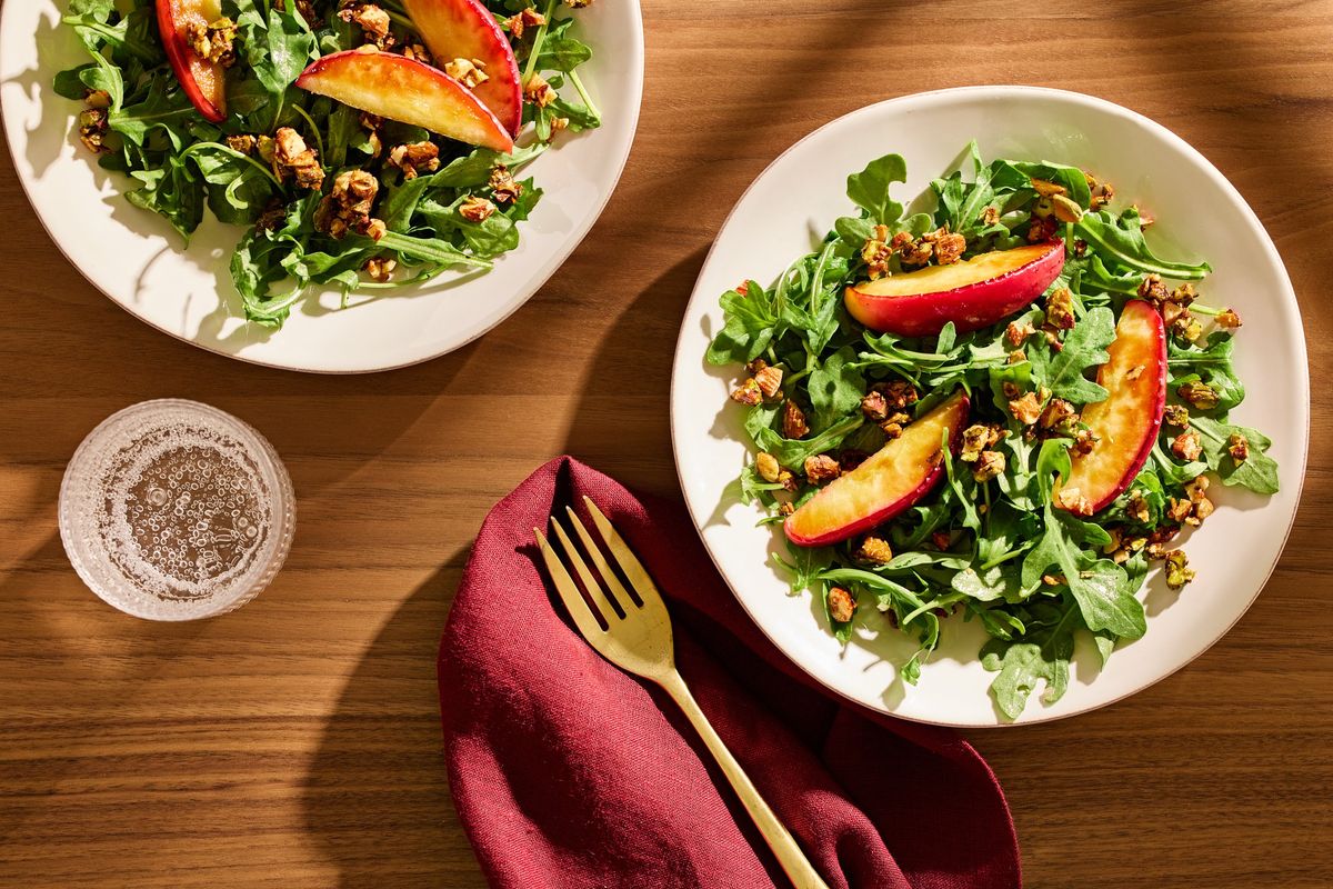 Pick a firm, sweet apple to saute to add to this arugula salad. (Tom McCorkle, food styling by Gina Nistico/Both for the Washington Post)