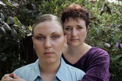 
Army Spc. Suzanne Swift, left, is shown with her mother, Sara Rich, in Rich's Eugene, Ore., yard in this Sept. 19 photo. Swift  says she was sexually harassed by noncommissioned officers and refuses to return to Iraq. 
 (File Associated Press / The Spokesman-Review)