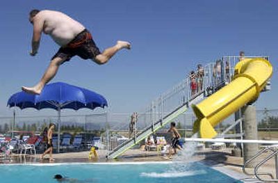 
Before your summer visitors drop in to grace you with their presence, give some thought to how you are going to feed and entertain them. Doing so now can save a lot of uncomfortable moments in this summer's heat.
 (SR File Photo / The Spokesman-Review)
