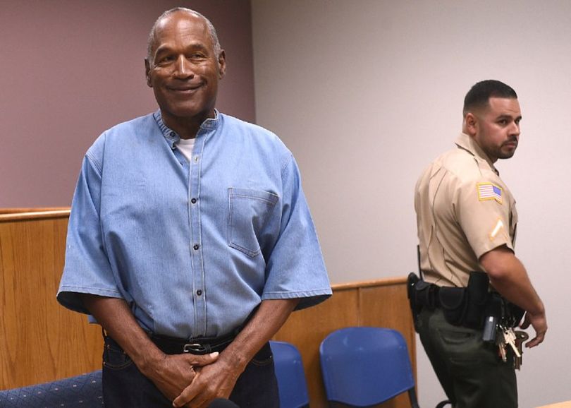 Former NFL football star O.J. Simpson enters for his parole hearing at the Lovelock Correctional Center in Lovelock, Nev., on Thursday, July 20, 2017. Simpson was convicted in 2008 of enlisting some men he barely knew, including two who had guns, to retrieve from two sports collectibles sellers some items that Simpson said were stolen from him a decade earlier. (Jason Bean/The Reno Gazette-Journal via AP, Pool) 