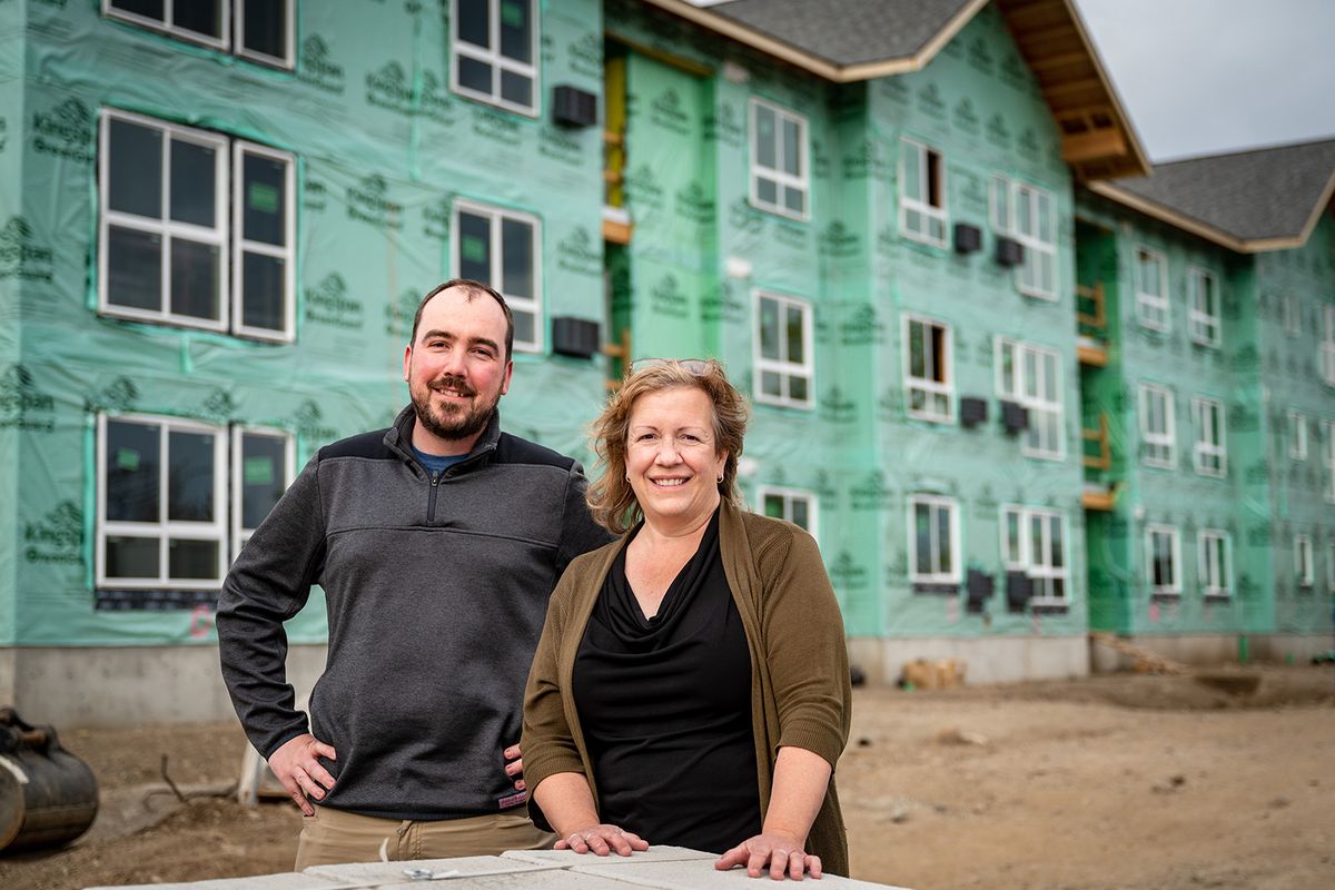 Jonathan Mallahan, Vice President of housing for Catholic Charities, and Peggy Haun-McEwen, director of community at Gonzaga Family Haven, visit the construction site of Gonzaga Family Haven, a 73-unit affordable housing complex at the corner of North Foothills Drive and Hamilton Street, Monday, May 3, 2021. Catholic Charities of Eastern Washington is spearheading the project.  (COLIN MULVANY/THE SPOKESMAN-REVI)