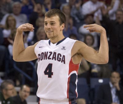 Gonzaga's Kevin Pangos mockingly wipes the sweat from his brow after hitting a 3-point shot in the the second half against Colorado State, Nov. 11, 2013, in the McCarthey Athletic Center. His basket put the Zags up 63-26. (Dan Pelle / The Spokesman-Review)