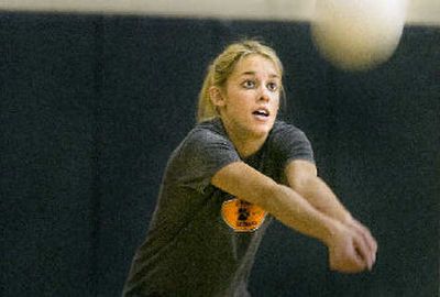 
Senior co-captain Erica Ehlo returns a serve during a practice this week for Lewis and Clark's volleyball team. 
 (Christopher Anderson / The Spokesman-Review)