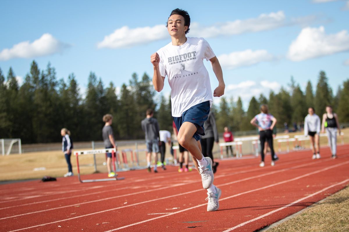 Senior track and field standout Spencer Barrera of Mt. Spokane  sprints  during a practice Tuesday. Barrera competes in the 400-meter dash, the triple jump and the long jump. (Libby Kamrowski / The Spokesman-Review)