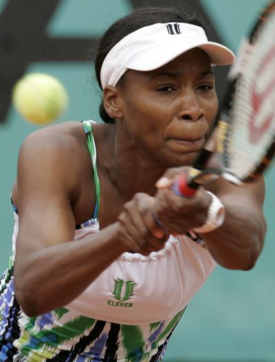 Venus Williams will attempt to defend her Wimbledon title.  (Associated Press / The Spokesman-Review)