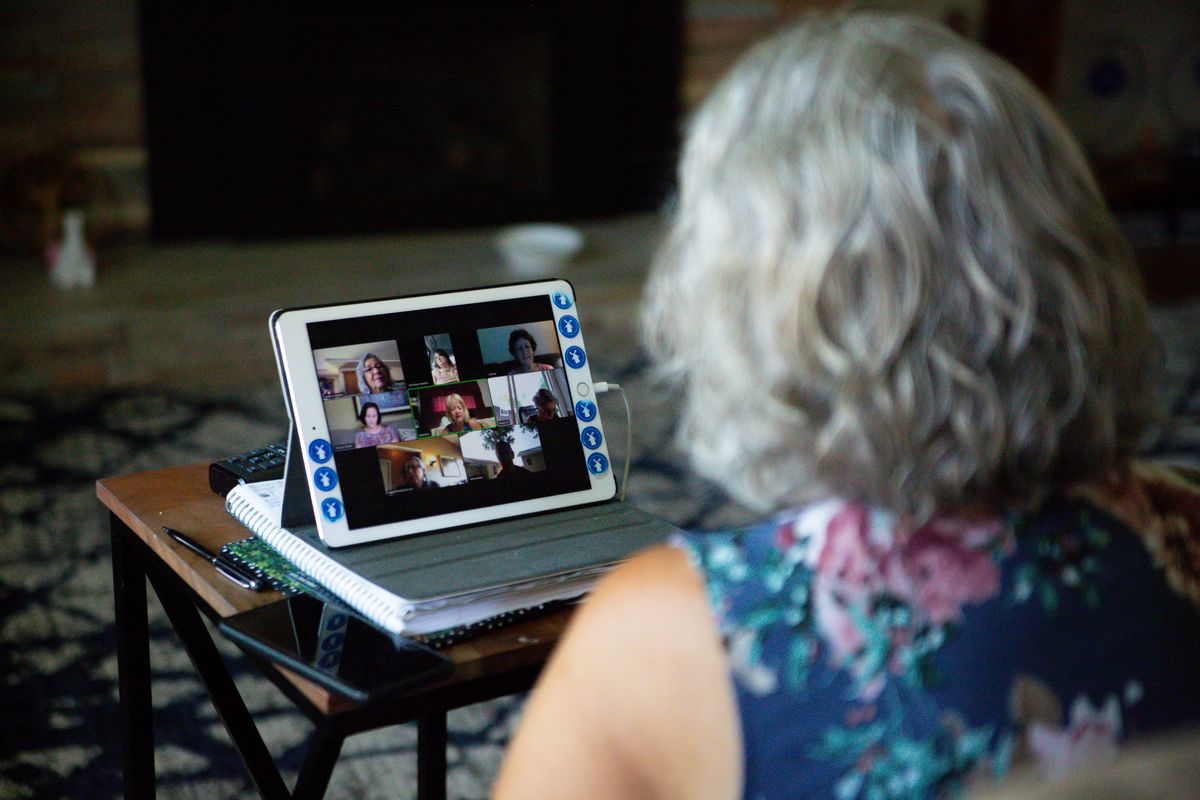 Nadine Hawley participates in a cross-country group Zoom call with the Sunday Connection from her home in north Spokane on July 11. Hawley has been a part of a larger group, One Fit Widow, since her husband died unexpectedly in 2016. She finds support, solace and new life from both groups, which bring together women who have lost their spouses.  (Libby Kamrowski/The Spokesman-Review)