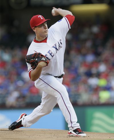 Texas Rangers pitcher Derek Holland is on the 15-day disabled list with a left shoulder injury. (LM Otero / Associated Press)