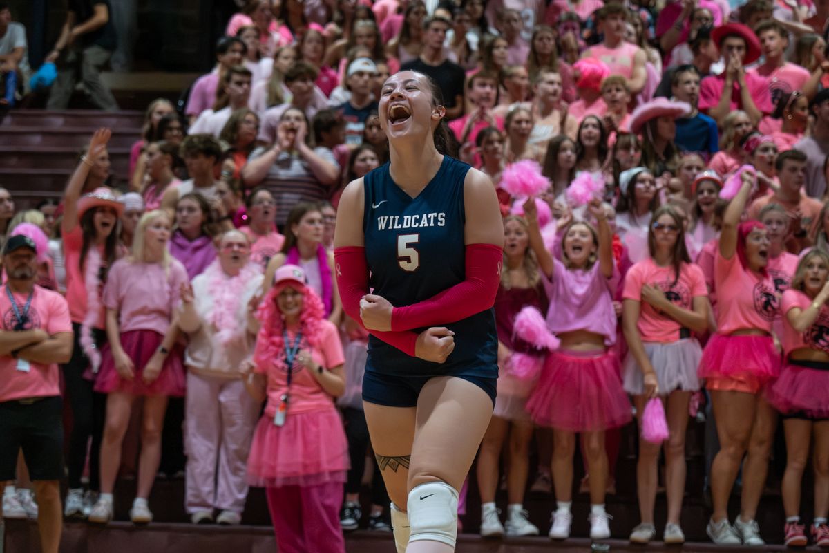 Mt. Spokane’s Kela Williams celebrates after the Wildcats won a point against Mead on Tuesday at Mt. Spokane High School in Mead. (Madison McCord/For The Spokesman-Review)