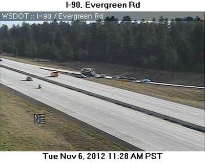 Traffic cameras were pointed toward the Evergreen exit around 11:30 a.m. where law enforcement and emergency crews were congregated for the arrest. (WSDOT Traffic Camera)