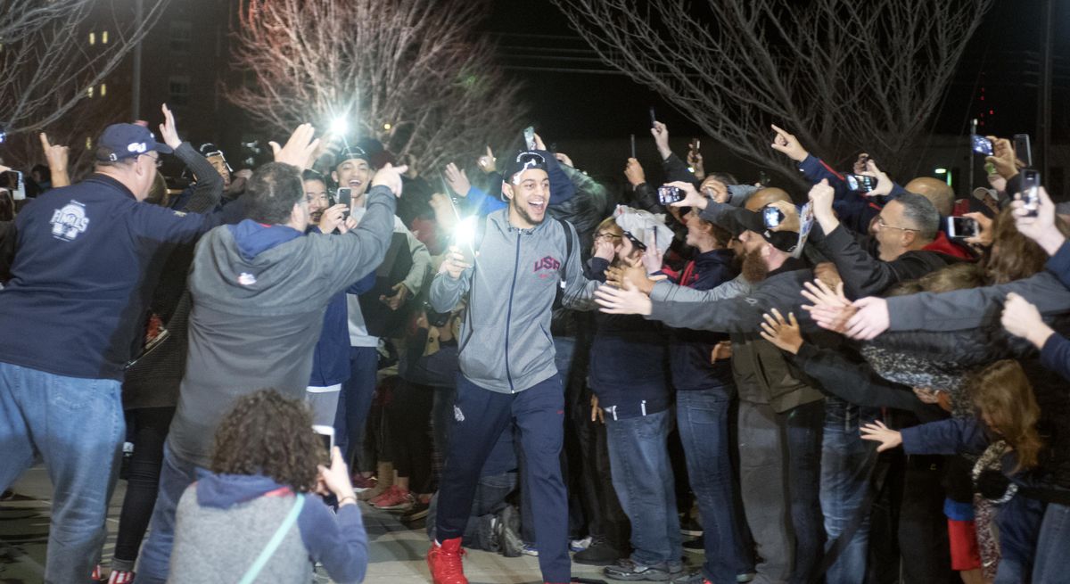 Gonzaga Bulldogs point guard Nigel Williams Goss, center, soaks up the enthusiastic welcome back to the Gonzaga campus late Saturday, after the Bulldogs victory over Xavier to put the Spokane team in the Final Four next weekend. (Jesse Tinsley / The Spokesman-Review)