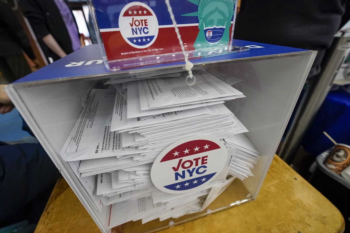 Absentee ballots are seen in a locked ballot box during early voting at the Park Slope Armory YMCA, Tuesday, Oct. 27, 2020, in the Brooklyn borough of New York.  (Mary Altaffer)