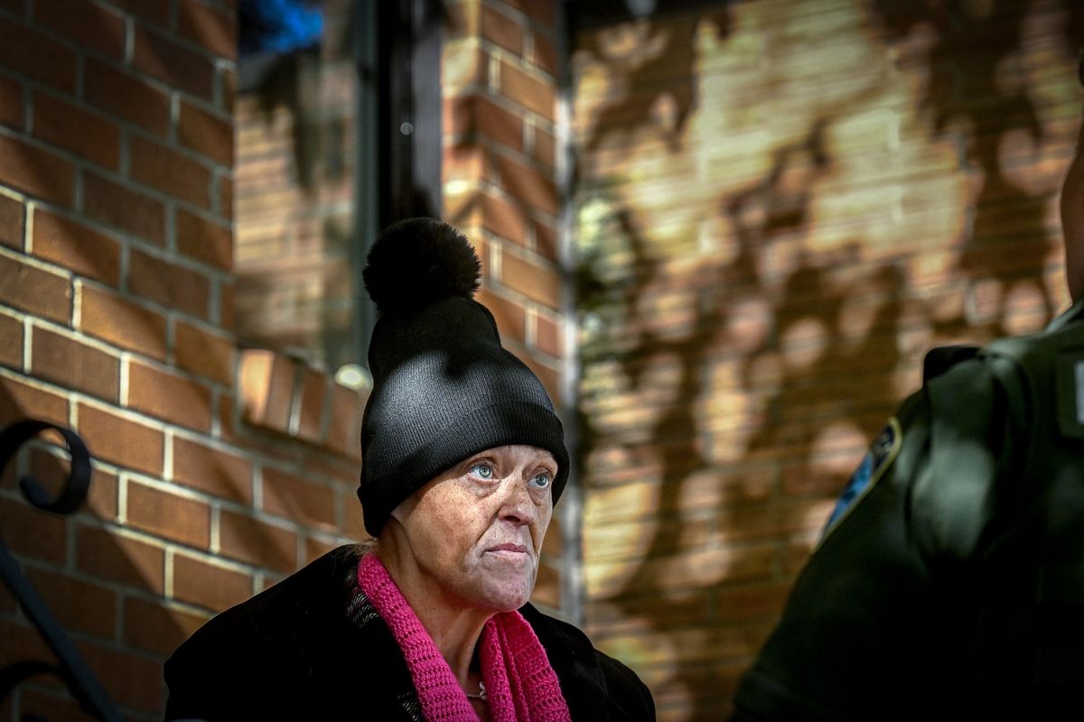 “He illegally locked me out,” Dawn Sherman said as she talked with Spokane Valley Homeless Outreach Officer Cat Horton at Spokane Valley Partners on Tuesday. (Kathy Plonka/The Spokesman-Review)