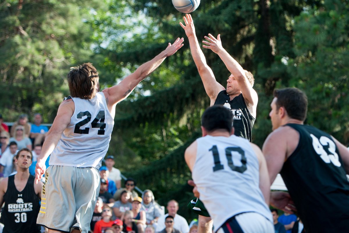 Roots Basketball’s Josh Wilson shoots against Spokane Club Elite in the men’s elite championship game won by Roots. (Tyler Tjomsland)