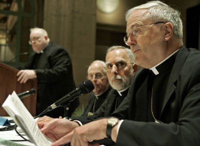 
Archbishop Jerome G. Hanus, right, Bishop Gerald Kicanas, second from right, and Archbishop Michael J. Sheehan, third from right, attend a news conference at the U.S. Conference of Catholic Bishops on Thursday in Los Angeles. 
 (Associated Press / The Spokesman-Review)