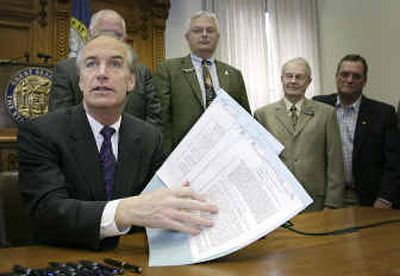
Gov. Dirk Kempthorne speaks to a room full of state legislators and supporters after he signed a $193 million agreement with the Nez Perce Tribe on water rights. 
 (Associated Press / The Spokesman-Review)