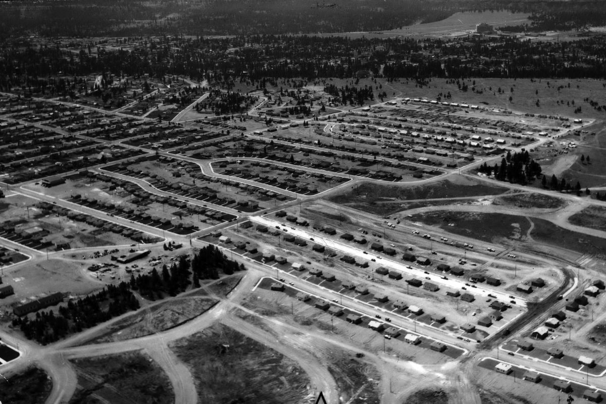 1950s: An aerial view looking southwest, with Loma Vista Park at bottom left, shows the uniformity of small two-bedroom homes throughout the neighborhood in North Spokane. Most of the houses were built by Western Builders, a partnership between R. Kline Hilman, Vincent C. Buck and Leo C. Higbee. Buck and Higbee bought out Hilman around 1949. For 25 years, Buck and Higbee built thousands of homes and a few commercial developments. During the post-war housing boom, most of the streets were made of crushed gravel.  (THE SPOKESMAN-REVIEW PHOTO ARCHIVE)