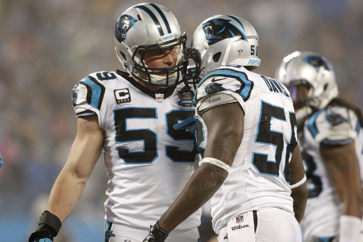 Carolina linebacker Luke Kuechly, left, made 10 tackles and snagged one interception in the Panthers