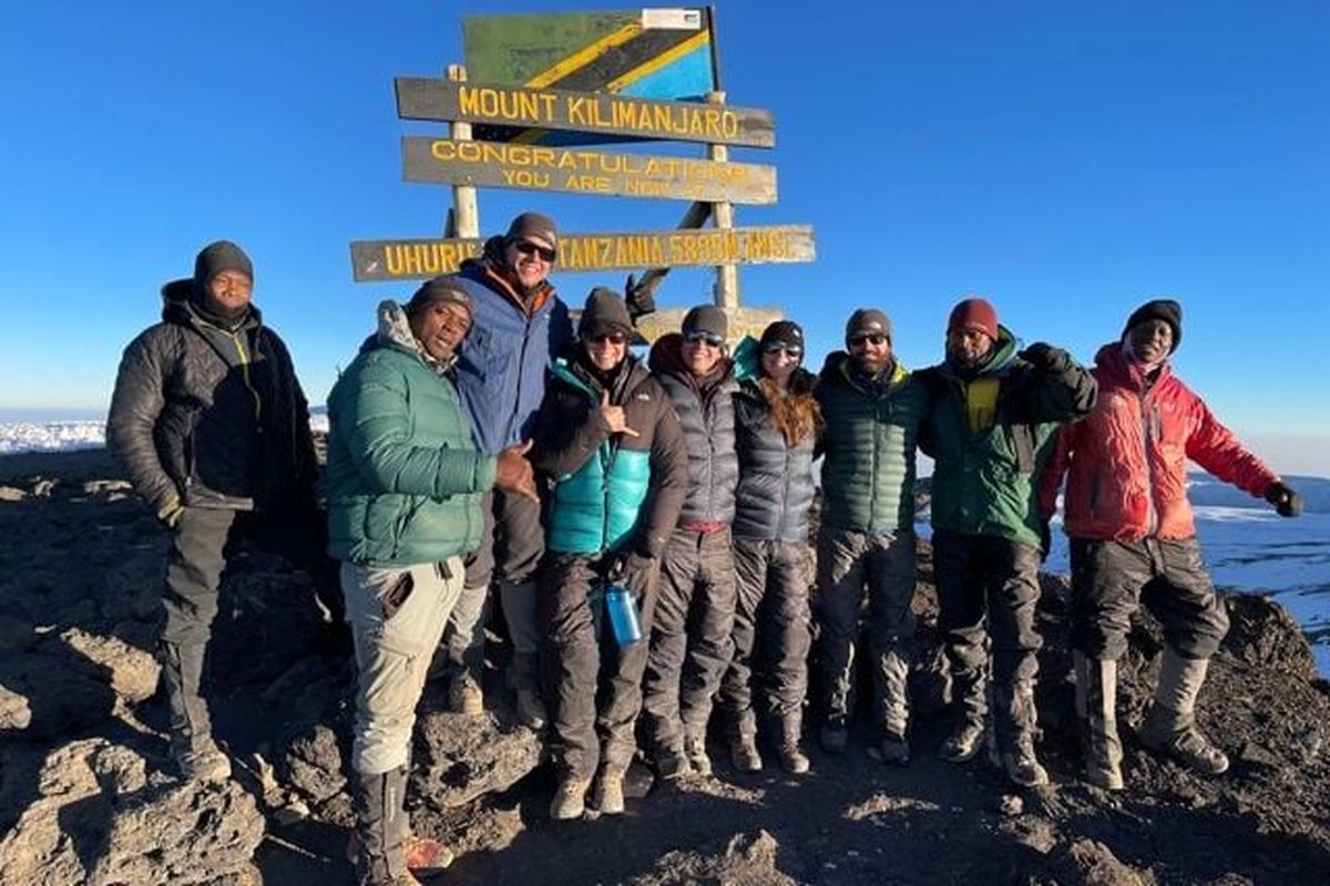 Brad Rimpela, third from left, summited Mount Kilimanjaro on July 4, 2021. Rimpela thought he might never climb again due to pain in his knees.  (Courtesy Brad Rimpela)