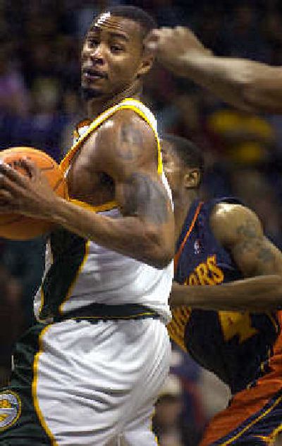 
Forward Rashard Lewis scored 15 points to help the Sonics beat Golden State. 
 (Jed Conklin / The Spokesman-Review)