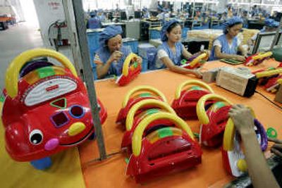 
Workers assemble toy cars at the production line of Dongguan Da Lang Wealthwise Plastic Factory in Dongguan, China. Soon, American consumers are going to have to bear the cost of safer toys. Associated Press
 (Associated Press / The Spokesman-Review)