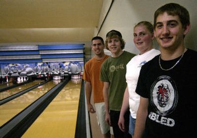 
From left, Josh Schmehl, Todd Benner, Malina Brown and Nick Schmehl are top bowlers in the junior league. 
 (Liz Kishimoto / The Spokesman-Review)