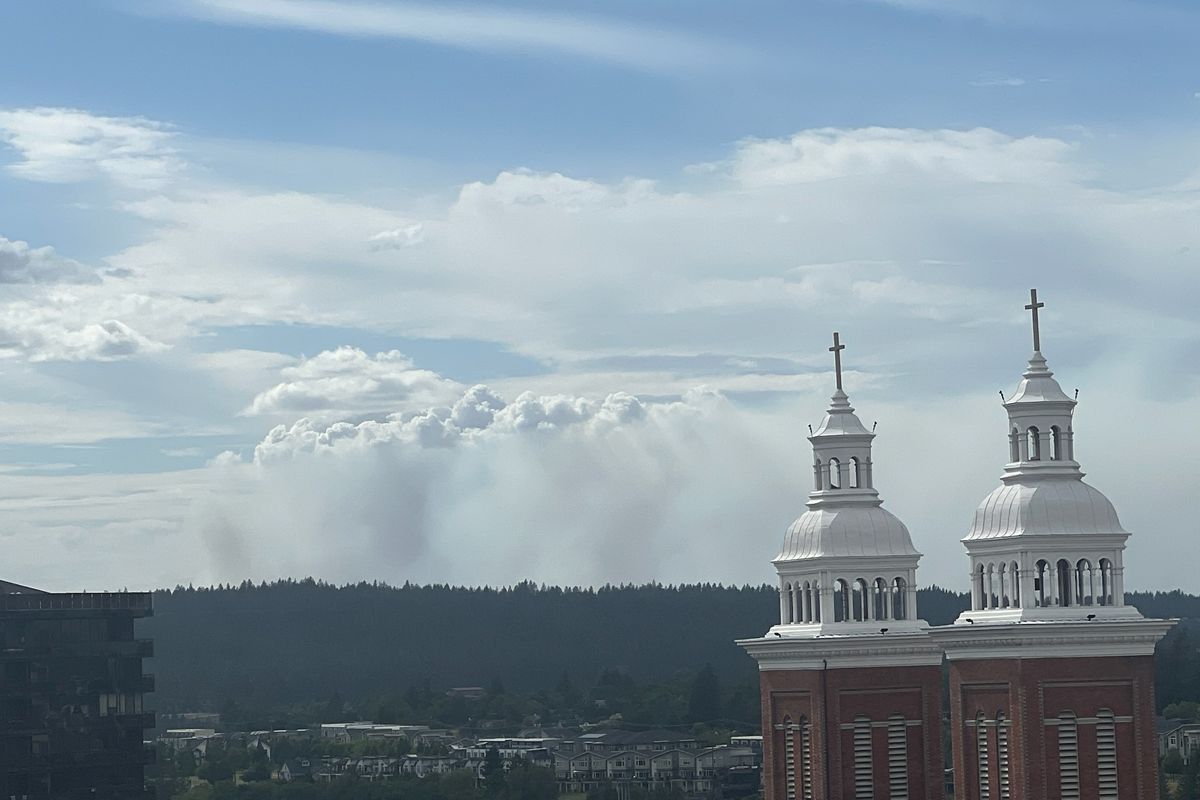 The Western Pines fire in Lincoln County was visible from downtown Spokane on Wednesday afternoon. (Jonathan Brunt/The Spokesman-Review)