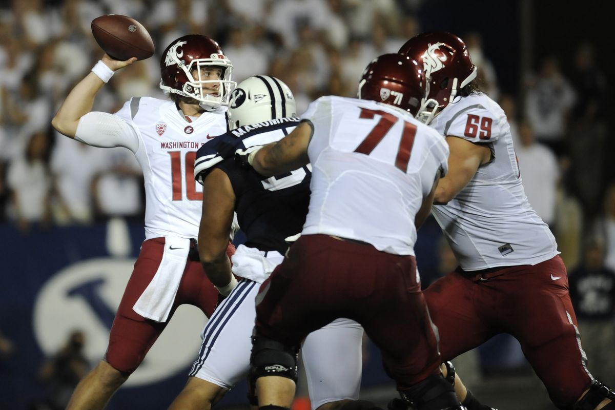 WSU quarterback Jeff Tuel completed 30 of 45 passes for 229 yards and had two interceptions. (Tyler Tjomsland)
