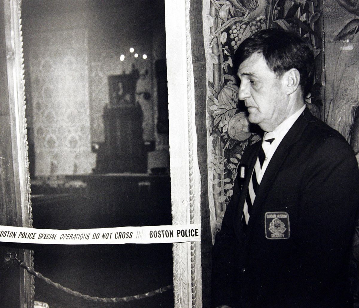 In this March 21, 1990 file photo, a security guard stands outside the Dutch Room of the Isabella Stewart Gardner Museum in Boston, where robbers stole more than a dozen works of art by Rembrandt, Vermeer, Degas, Manet and others, in an early morning robbery March 18, 1990. A Dutch sleuth has his sights set on what he calls the Holy Grail of stolen art: A collection worth $500 million snatched in 1990 in the largest art heist in U.S. history from Bostons Isabella Stewart Gardner Museum. (Associated Press)
