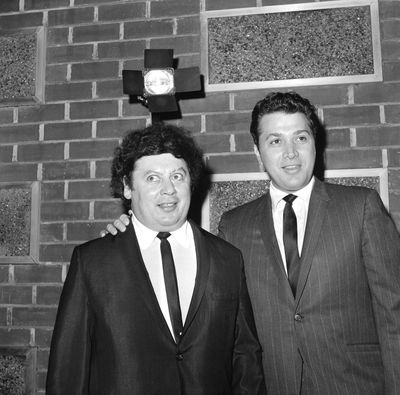 In this Dec. 10, 1965, file photo, the comedy team of Marty Allen, left, and Steve Rossi, making their first film on the Paramount lot in Los Angeles. Allen's spokeswoman Candi Cazau says he died Monday, Feb. 12, 2018, of complications from pneumonia. His wife and performing partner Karon Kate Blackwell was by his side. He was 95. (David F. Smith / AP)