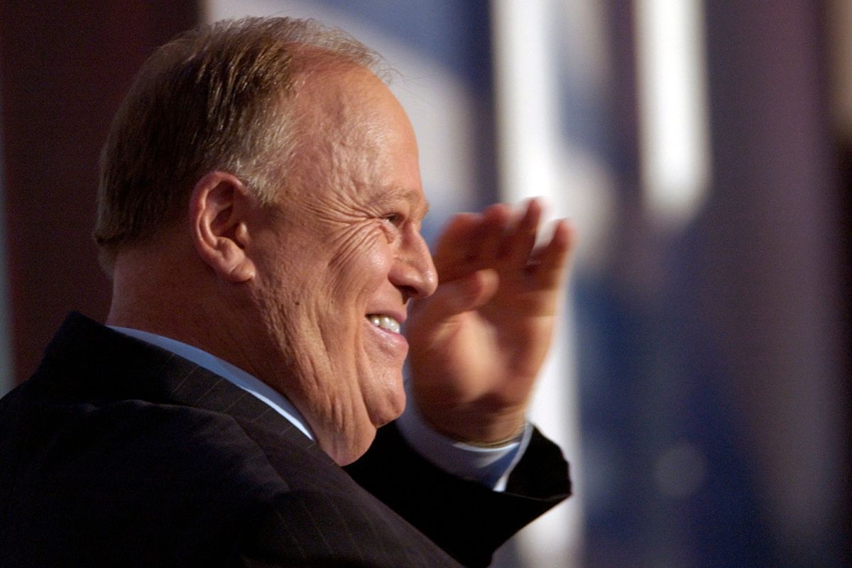 FILE - Former Georgia Senator Max Cleland salutes delegates before introducing Sen. John Kerry at the Democratic National Convention Thursday, July 29, 2004, at the Fleet Center in Boston, Mass. President Joe Biden and three former presidents have paid tribute to late Veterans Administration chief and U.S. senator Cleland, who lost limbs while serving in Vietnam. Cleland died of congestive heart failure in November at age 79, but his memorial service was delayed until Wednesday, May 25, 2022, because of the coronavirus pandemic. (Ed Reinke)
