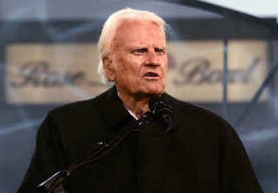 
The Rev. Billy Graham gives a sermon during the final night of a crusade at the Rose Bowl in Pasadena, Calif., on Sunday. 
 (Associated Press / The Spokesman-Review)