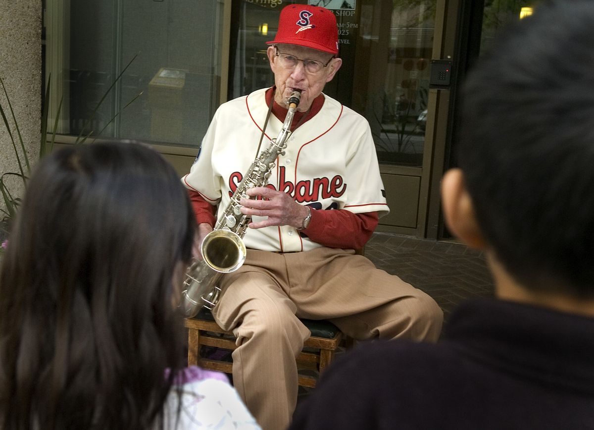 The Spokesman-Review  Dwight Aden plays his saxophone as part of a benefit for the Second Harvest Food Bank on May 11, 2007 in downtown Spokane. (File / The Spokesman-Review)