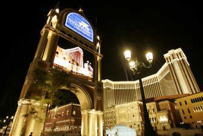 
The new Venetian Macao Resort Hotel claims to have 550,000 square of gambling space, 3,400 slot machines, 3,000 rooms, a 15,000-seat sports arena and retail space for 350 stores. Associated Press
 (Associated Press / The Spokesman-Review)