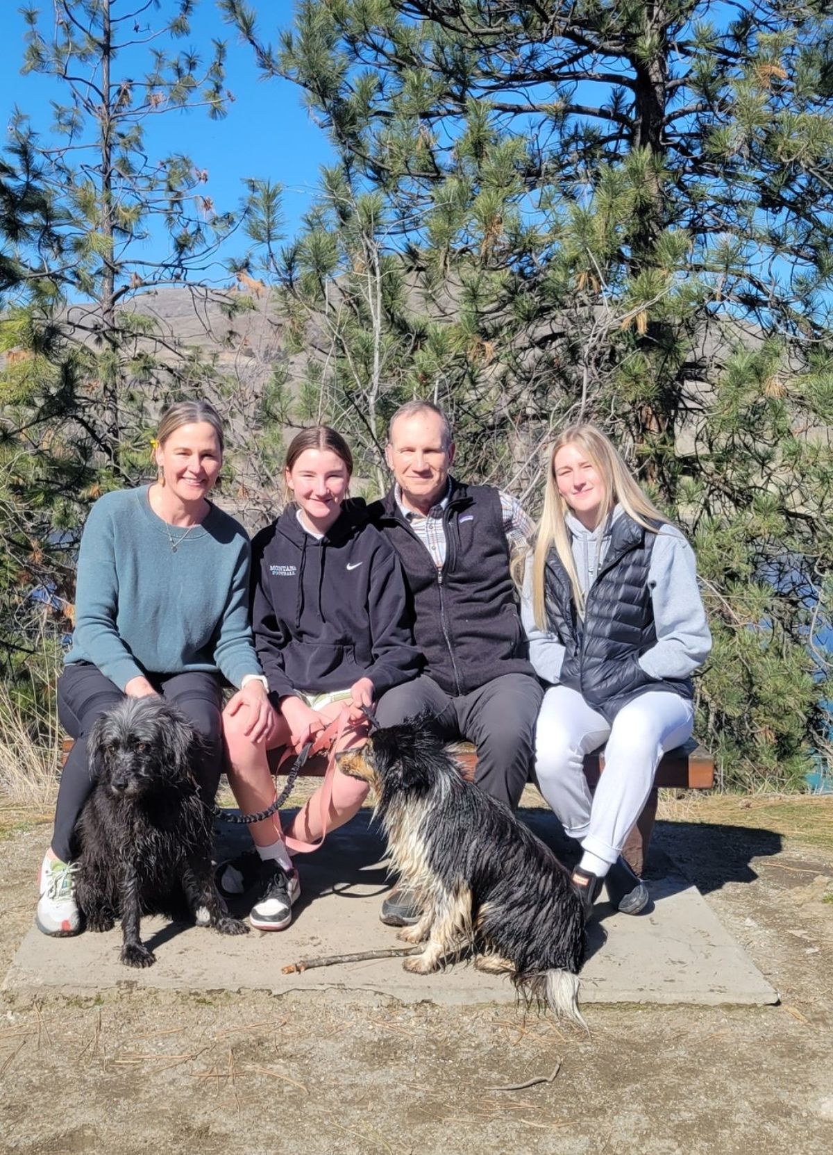 Kim Exner-Rosenbach, left, poses for a photo with her husband Timm Rosenbach and two children Lane and Reece Tammy.  (Courtesy of Kim Exner-Rosenbach)