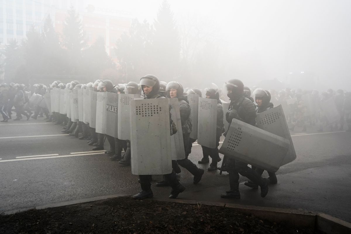 Riot police walk to block demonstrators during a protest in Almaty, Kazakhstan, Wednesday, Jan. 5, 2022. Demonstrators denouncing the doubling of prices for liquefied gas have clashed with police in Kazakhstan