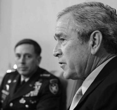 
President Bush, seen Monday with Gen. David Petraeus in the Oval Office, reiterated his support for Attorney General Alberto Gonzales. 
 (Associated Press / The Spokesman-Review)