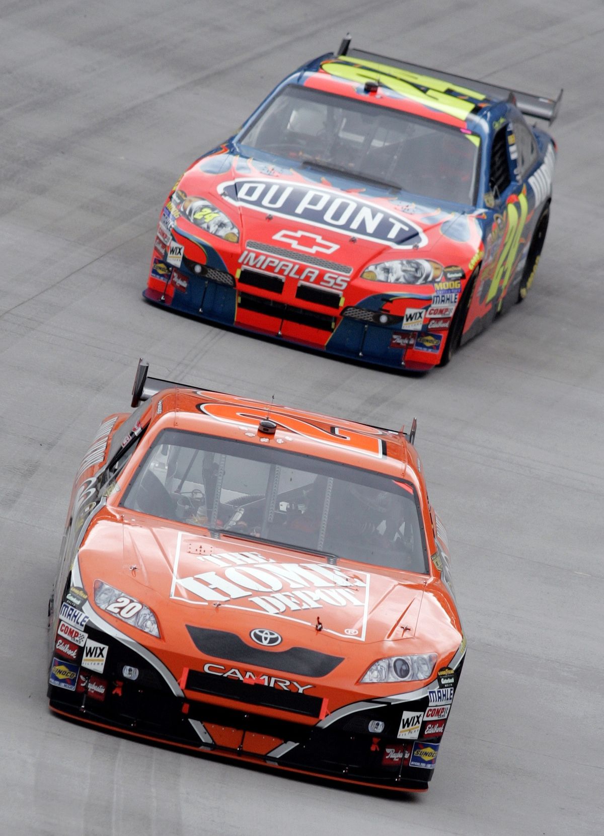 Tony Stewart, front, and Jeff Gordon battled at Bristol, Tenn., in March.  (Associated Press / The Spokesman-Review)