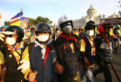 Anti-government protesters  march on  parliament   in Bangkok today.  (Associated Press / The Spokesman-Review)