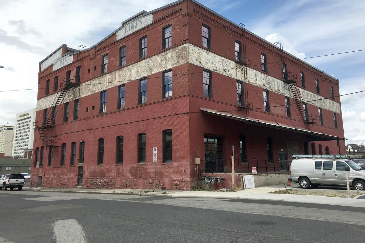 Present day: The former Washington Cracker Co. building is being refurbished into a multiple-use commercial space for entertainment, restaurants and a winery. After decades as a bakery, it was used for many years as a warehouse for moving and storage companies. (Jesse Tinsley / The Spokesman-Review)
