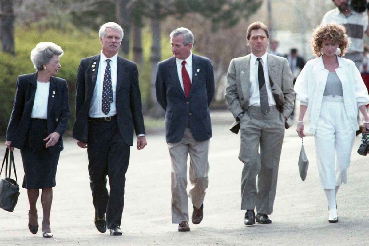 Media magnate Ted Turner, second from left, walks around Riverfront Park with Spokane area Goodwill Games organizers, former Spokane mayor Vicki McNeill, left, and Tom Garrett, third from left, as they brief him on April 11, 1990, about the upcoming Goodwill Games events in Spokane.  (Shawn Jacobson/THE SPOKESMAN-REVIEW)