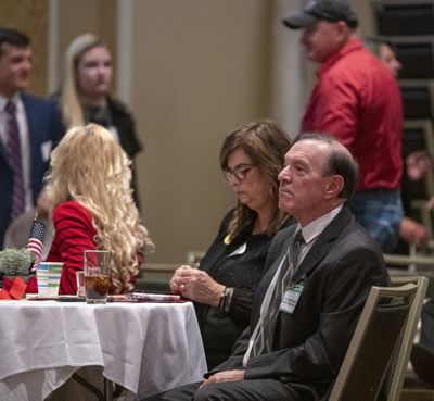 Spokane County Prosecutor, right, attends the election night festivities for the local Republican party Tuesday, Nov. 8, 2022 at the Davenport Hotel. His wife Lesley is sitting behind him.  (Jesse Tinsley/The Spokesman-Review)