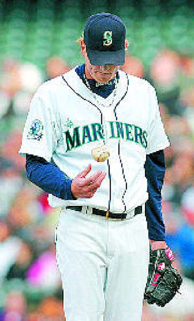 M's starter Jeff Weaver was replaced in the first inning after giving up six runs.
(Associated Press / The Spokesman-Review)