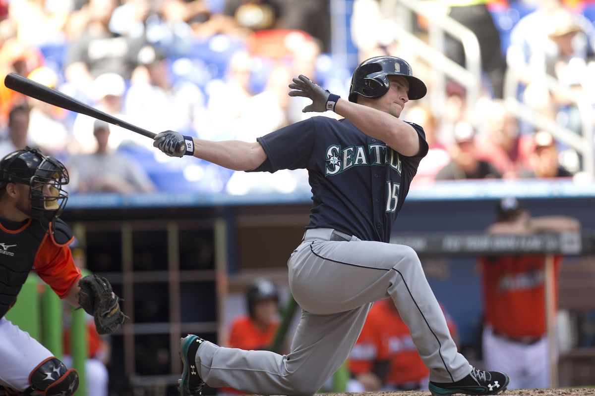 Mariners’ Kyle Seager strikes out with bases loaded to end the seventh inning of Sunday’s game in Miami. (Associated Press)