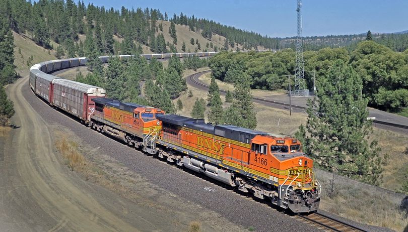 A BNSF freight train rolls through the Marshall area just south of Spokane Wash. Thursday August 11, 2011. Trains are harder to jump since the design of the individual cars has become more specialized and streamlined.  (SR file photo)