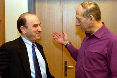 
In a photo released by the Israeli government, acting Israeli Prime Minister Ehud Olmert, right, meets White House official Elliot Abrams in Jerusalem on Friday. 
 (Associated Press / The Spokesman-Review)